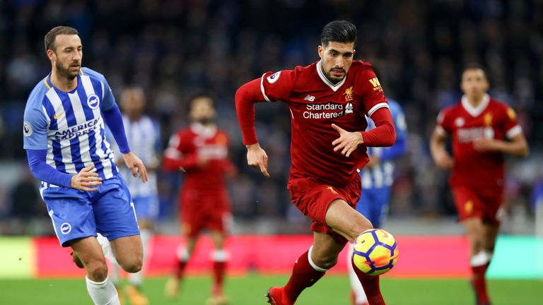 Emre Can in action during the Premier League match between Brighton and Liverpool