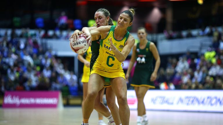 LONDON, ENGLAND - JANUARY 20: Australia's Kim Ravaillion looks to hold of the challenge from South Africa's Erin Burger during the Netball Quad Series Vita