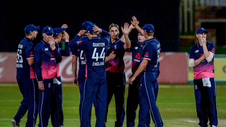 POTCHEFSTROOM, SOUTH AFRICA - DECEMBER 03:  Will Jacks of England celebrates with teammates after dismissing Jiveshen Pillay of South Africa during the U/1