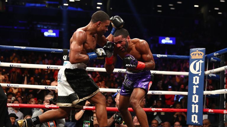 Errol Spence punches Lamont Peterson during their IBF Welterweight title fight at the Barclays Center on January 20 2018