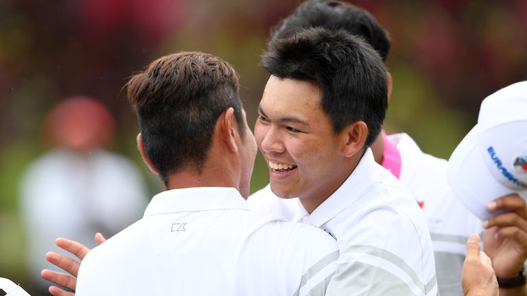 KUALA LUMPUR, MALAYSIA - JANUARY 13:  Phachara Khongwatmai and Hideto Tanihara of Asia celebrate during the foursomes matches on day two of the 2018 EurAsi