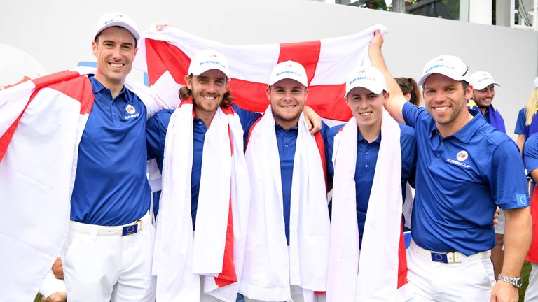 KUALA LUMPUR, MALAYSIA - JANUARY 14:  (L-R) Ross Fisher, Tommy Fleetwood, Tyrell Hatton, Matthew Fitzpatrick and Paul Casey of Europe celebrate with an Eng