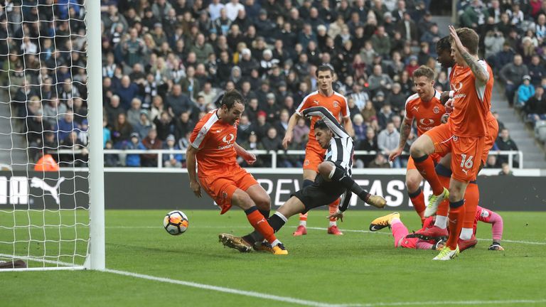 Ayoze Perez of Newcastle United scores the opening goal during The Emirates FA Cup Third Round match v Luton Town