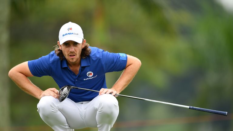 KUALA LUMPUR, MALAYSIA - JANUARY 14:  Tommy Fleetwood of Europe lines up a putt on the 1st green during the singles matches on day three of the 2018 EurAsi