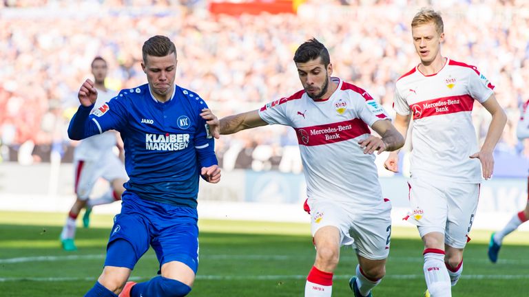 KARLSRUHE, GERMANY - OCTOBER 30: Florian Kamberi of Karlsruhe challenges Emiliano Insua of Stuttgart during the Second Bundesliga match between Karlsruher 
