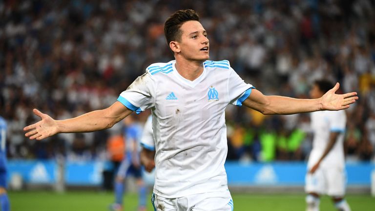 Olympique de Marseille's French midfielder Florian Thauvin celebrates after scoring his team's third goal during the UEFA Europa League playoff round secon