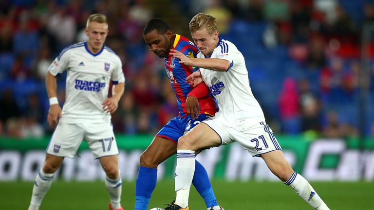 Jason Puncheon of Crystal Palace (left) and Flynn Downes of Ipswich battle for possession in the Carabao Cup