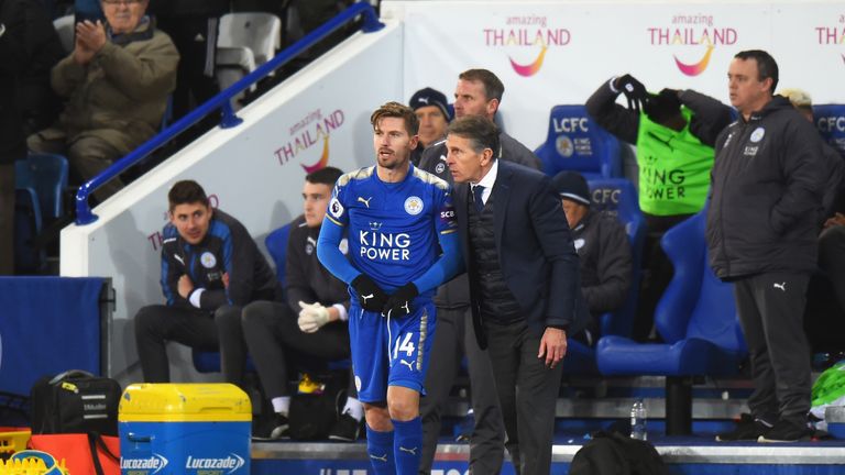 Adrien Silva talks with Leicester manager Claude Puel as he prepares to make his debut against Huddersfield