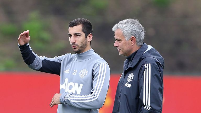 Henrikh Mkhitaryan and Jose Mourinho