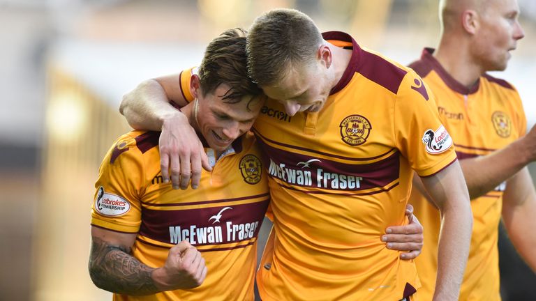 Motherwell's Craig Tanner (left) celebrates with his team-mates after scoring his side's second goal of the game