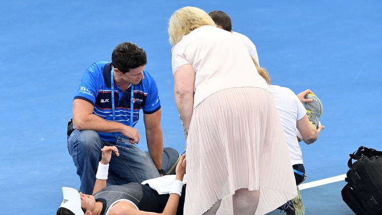 BRISBANE, AUSTRALIA - JANUARY 02:  Garbine Muguruza of Spain is injured in her match against Aleksandra Krunic of Serbia during day three of the 2018 Brisb