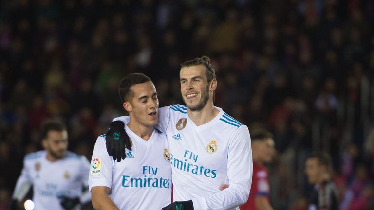 SORIA, SPAIN - JANUARY 04: Gareth Bale of Real Madrid celebrates with Lucas Vazquez after scoring his team's opening goal from the penalty spot during the 