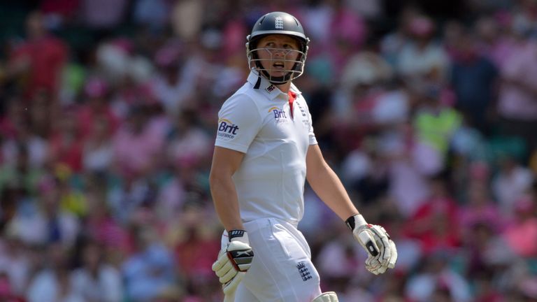 England's batsman Gary Ballance walks back to the pavilion following his dismissal off the bowling of Australia's paceman Mitchell Johnson on the third day