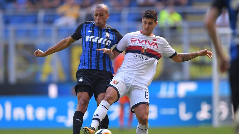 Inter Milan's Brazilian defender  Miranda (L)vies with Genoa's Italian forward Pietro Pellegri during the Italian Serie A football match Inter Milan vs Gen