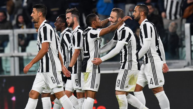 Douglas Costa scored the only goal against Genoa as Juventus moved a point behind Serie A leaders Napoli
