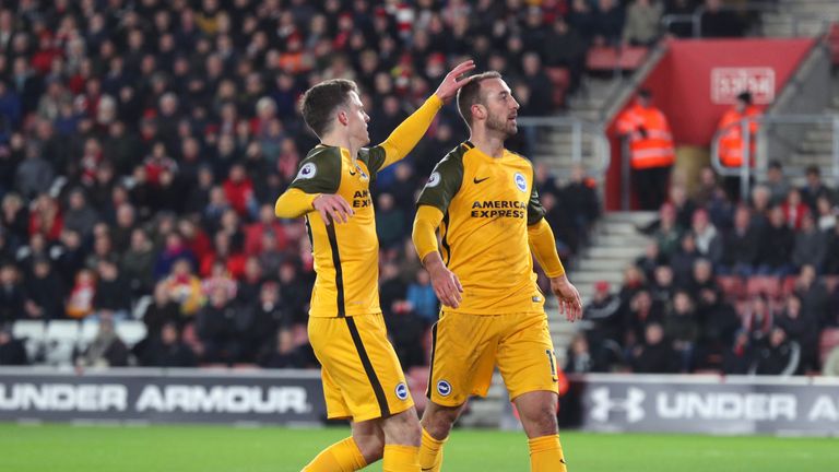 Brighton & Hove Albion's Glenn Murray (right) celebrates scoring his side's first goal of the game from the penalty spot with Solly March during the Premie