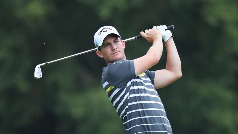 JOHANNESBURG, SOUTH AFRICA - JANUARY 14:  Chris Paisley of England plays his second shot on the 5th hole during day four of the BMW South African Open Cham