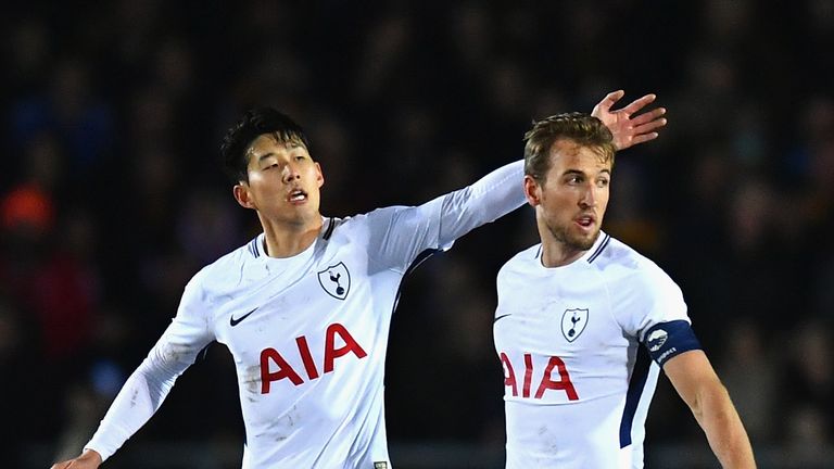 Harry Kane of Tottenham Hotspur celebrates with Heung-Min Son after scoring against Newport