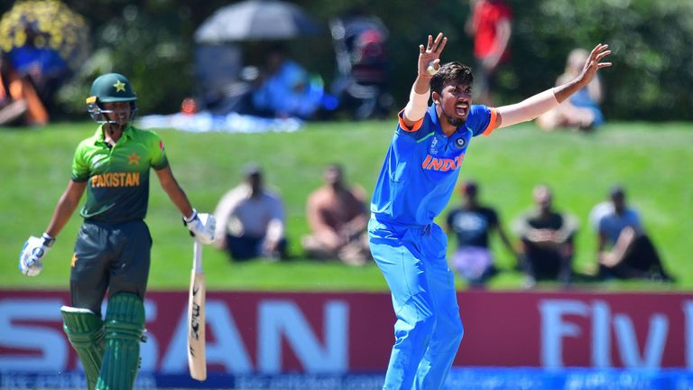 India's Ishan Porel (R) appeals for a leg-before-wicket call on Pakistan's Ammad Alam (L) during the U19 semi-final cricket World Cup