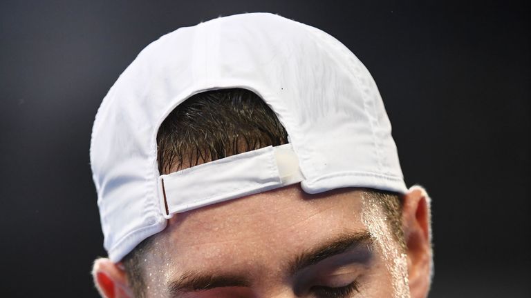 A disappointed John Isner of the United States  after losing his first round match against Aussie Matthew Ebden