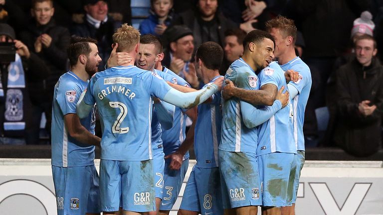 Coventry City's Jack Grimmer (no.2) celebrates scoring his side's second goal of the game with team-mates during the FA Cup, third round match v Stoke