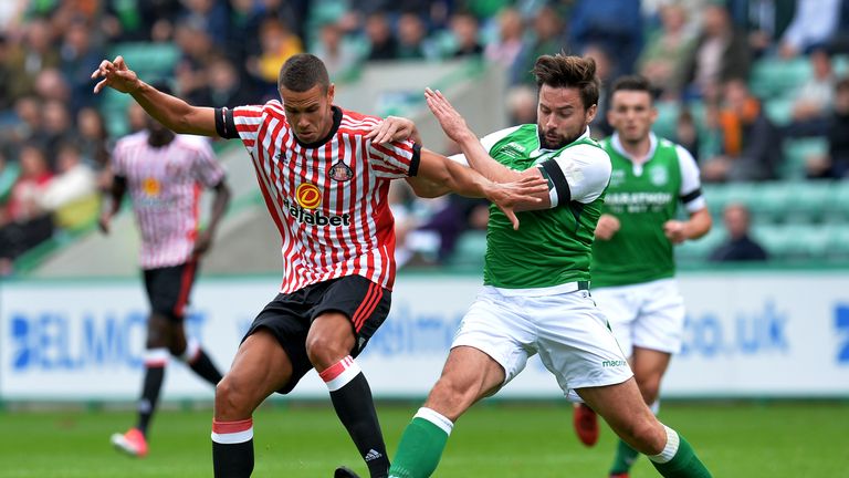 EDINBURGH, SCOTLAND - JULY 09: Jack Rodwell of Sunderland is tackled by Darren McGregor of Hibernian in the first half during the pre season friendly betwe