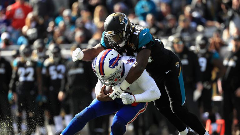 JACKSONVILLE, FL - JANUARY 07: Outside linebacker Myles Jack #44 of the Jacksonville Jaguars tackles quarterback Tyrod Taylor #5 of the Buffalo Bills in th