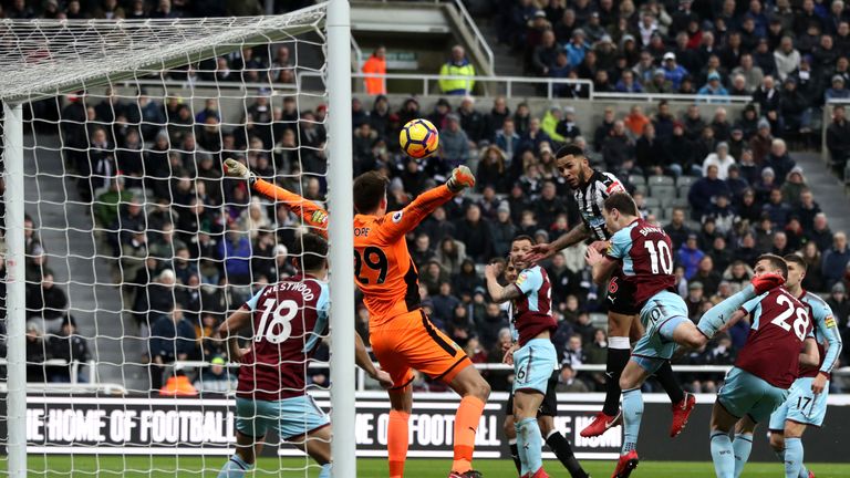 NEWCASTLE UPON TYNE, ENGLAND - JANUARY 31:  Jamaal Lascelles of Newcastle United scores his sides first goal during the Premier League match between Newcas