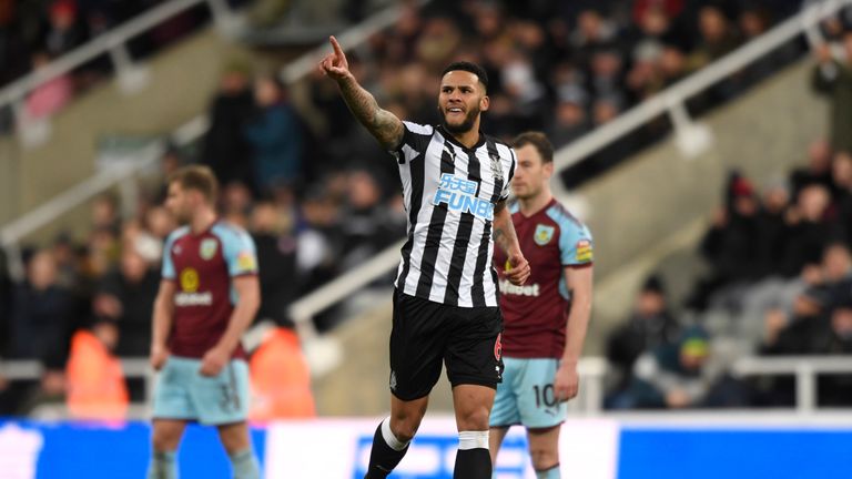 NEWCASTLE UPON TYNE, ENGLAND - JANUARY 31:  Jamaal Lascelles of Newcastle United celebrates after scoring his sides first goal   during the Premier League 