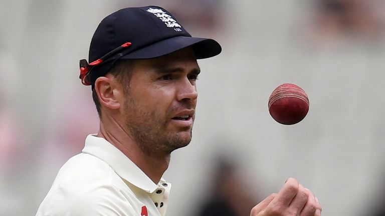England paceman James Anderson inspects the ball on final day of the fourth Ashes cricket Test match against Australia at the MCG in Melbourne on December 