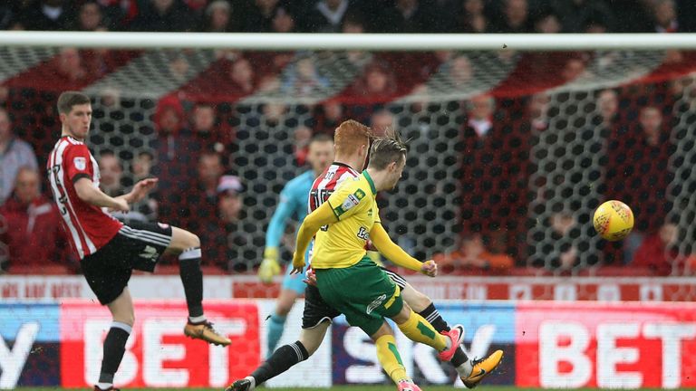 BRENTFORD, ENGLAND - JANUARY 27: James Maddison of Norwich City scores his sides first goal during the Sky Bet Championship match between Brentford and Nor