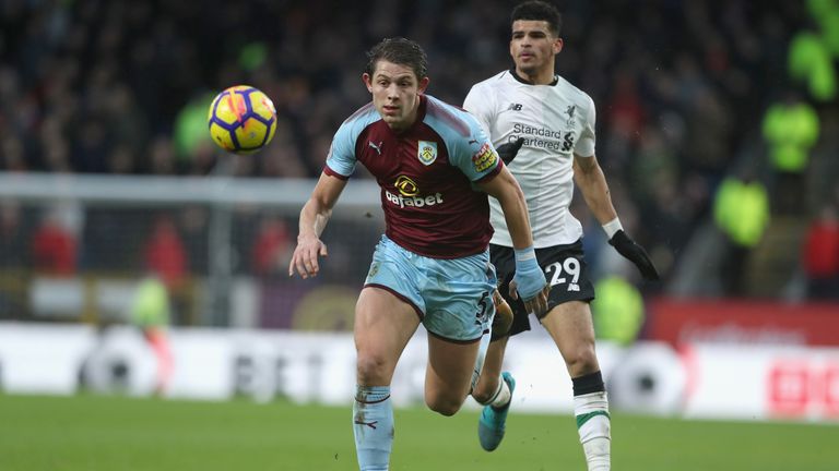James Tarkowski of Burnley gets away from Dominic Solanke of Liverpool during the Premier League match between Burnley and L
