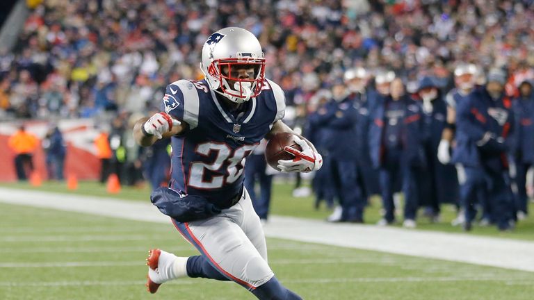FOXBOROUGH, MA - JANUARY 13:  James White #28 of the New England Patriots carries the ball for a touchdown  in the second quarter of the AFC Divisional Pla