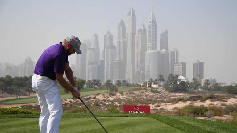 DUBAI, UNITED ARAB EMIRATES - JANUARY 26:  Jamie Donldson of Wales hits his tee shot on the 8th hole during round two of the Omega Dubai Desert Classic at 