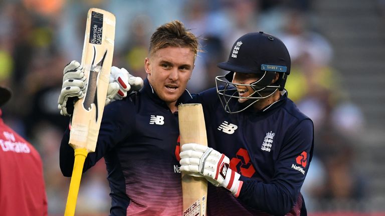 England batsman Jason Roy (L) celebrates with teammate Joe Root (R) after scoring his century against Australia during their one-day international cricket 