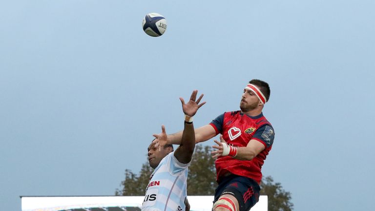 Racing 92's Fijian lock Leone Nakarawa (centre left) and Munster's South African lock Jean Kleyn compete for the ball in the line-out during the European R