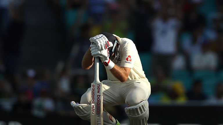 SYDNEY, AUSTRALIA - JANUARY 04:  Joe Root of England looks dejected after being dismissed by Mitchell Starc of Australia during day one of the Fifth Test m