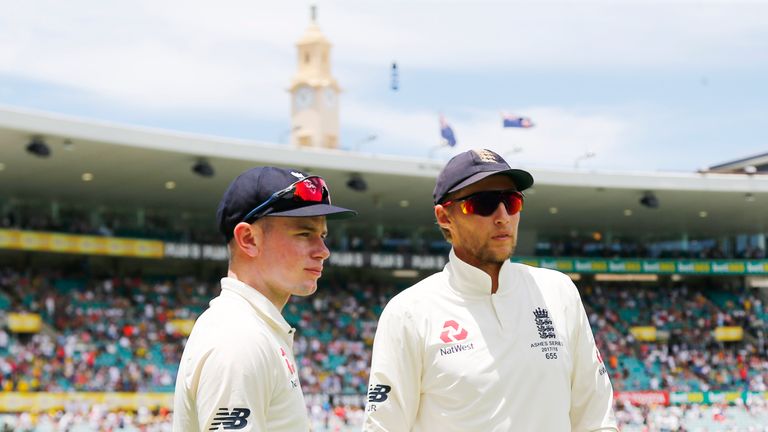 England's Joe Root talks with Mason Crane on day two of the fifth Ashes Test match at Sydney Cricket Ground