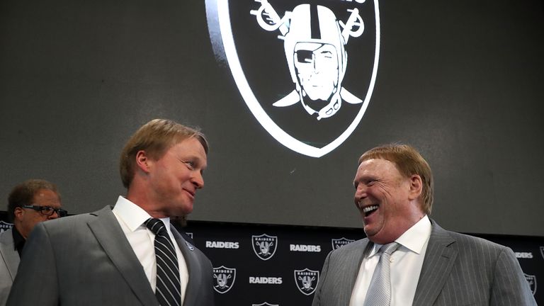 ALAMEDA, CA - JANUARY 09:  Oakland Raiders new head coach Jon Gruden (L) talks with Raiders owner Mark Davis during a news conference at Oakland Raiders he