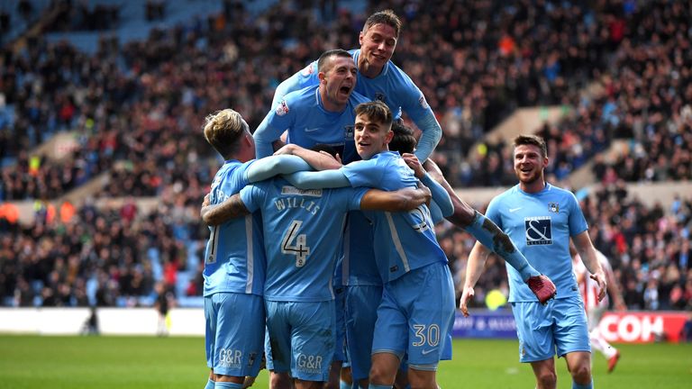 Jordan Willis  celebrates with team-mates after scoring for Coventry against Stoke