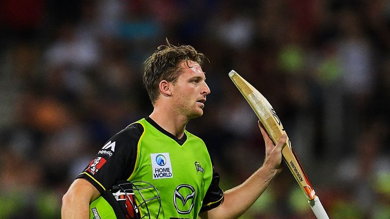 SYDNEY, AUSTRALIA - JANUARY 01: Jos Buttler of the Thunder walks from the field after being dismissed by Matthew Wade of the Hurricanes during the Big Bash