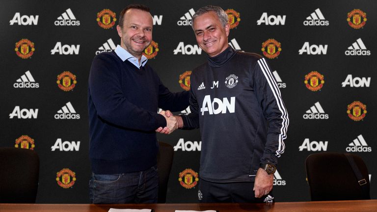 MANCHESTER, ENGLAND - JANUARY 25:  (EXCLUSIVE COVERAGE) Manager Jose Mourinho (R) of Manchester United shakes hands with Executive Vice-Chairman Ed Woodwar