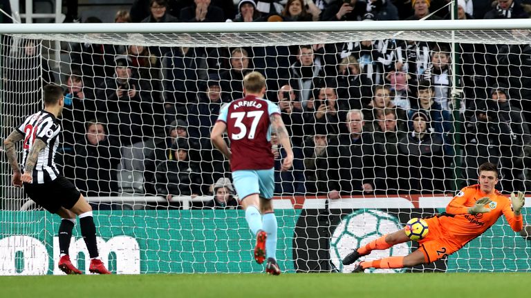NEWCASTLE UPON TYNE, ENGLAND - JANUARY 31:  Joselu of Newcastle United misses a penalty kick saved Nick Pope of Burnley during the Premier League match bet