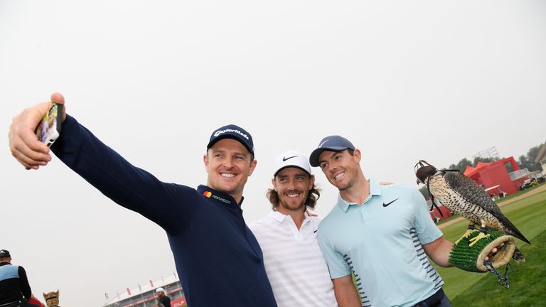 ABU DHABI, UNITED ARAB EMIRATES - JANUARY 16:  (L-R)  Justin Rose of England, Tommy Fleetwood of England and Rory McIlroy of Northern Ireland take part in 