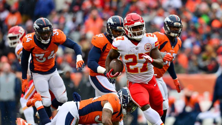 DENVER, CO - DECEMBER 31:  Running back Kareem Hunt #27 of the Kansas City Chiefs breaks away for a first quarter touchdown run against the Denver Broncos 