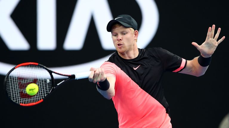 MELBOURNE, AUSTRALIA - JANUARY 25:  Kyle Edmund of Great Britain plays a forehand in his semi-final match against Marin Cilic of Croatia on day 11 of the 2