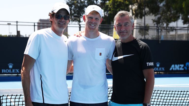 Kyle Edmund of Great Britain (C) poses for a photo with his physical performance coach Ian Prangley (L) and coach Fredrik Rosengren