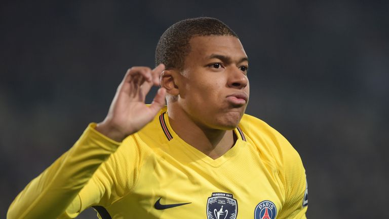 Paris Saint-Germain's French forward Kylian Mbappe celebrates after scoring during the French Cup football match between Rennes (SRFC) and Paris-Saint-Germ