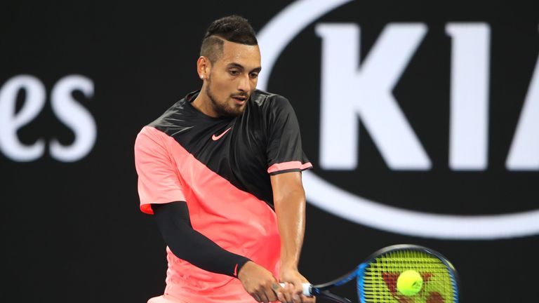 MELBOURNE, AUSTRALIA - JANUARY 15:  Nick Kyrgios of Australia plays a backhand in his first round match against Rogerio Dutra Silva of Brazil on day one of