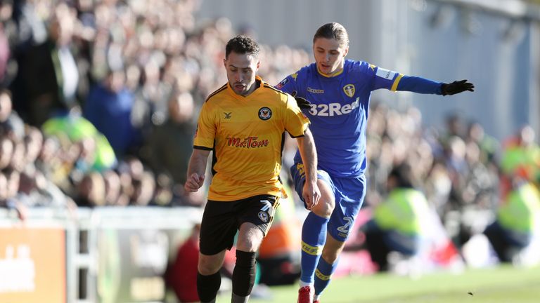 Newport County's Robbie Willmott (left) and Leeds United's Pawel Cibicki battle for the ball